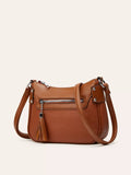 Women's Leather Crossbody Bag with Decorative Tassel - Light Brown